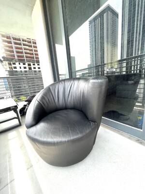 1970s Vladimir Kagan style Asymmetrical Black Leather Swivel  Nautilus  Chair. 