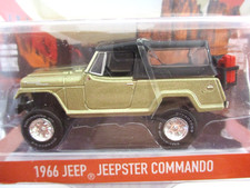 GREENLIGHT - LIFTED 1966 JEEP JEEPSTER COMMANDO 4X4 - 50TH ANNIVERSARY - 1/64