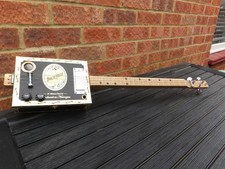 3 STRING HOMEMADE FRETTED ACOUSTIC/ELECTRIC[MAGNETIC PICKUP] CIGAR BOX GUITAR.