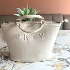 DKNY Cream Leather Tote Bag Zip Closure Red Lining Double Handles Inner Pockets