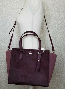 plum kate spade purse
