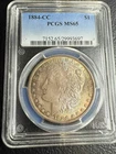 1884 CC Morgan Silver Dollar $1 PCGS MS65 ‼️GEM UNC W/ BABY BLUE RAINBOW TONE‼️