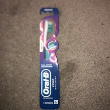 16 Oral b Vivid Whitening toothbrush, Medium, Mixed Colors