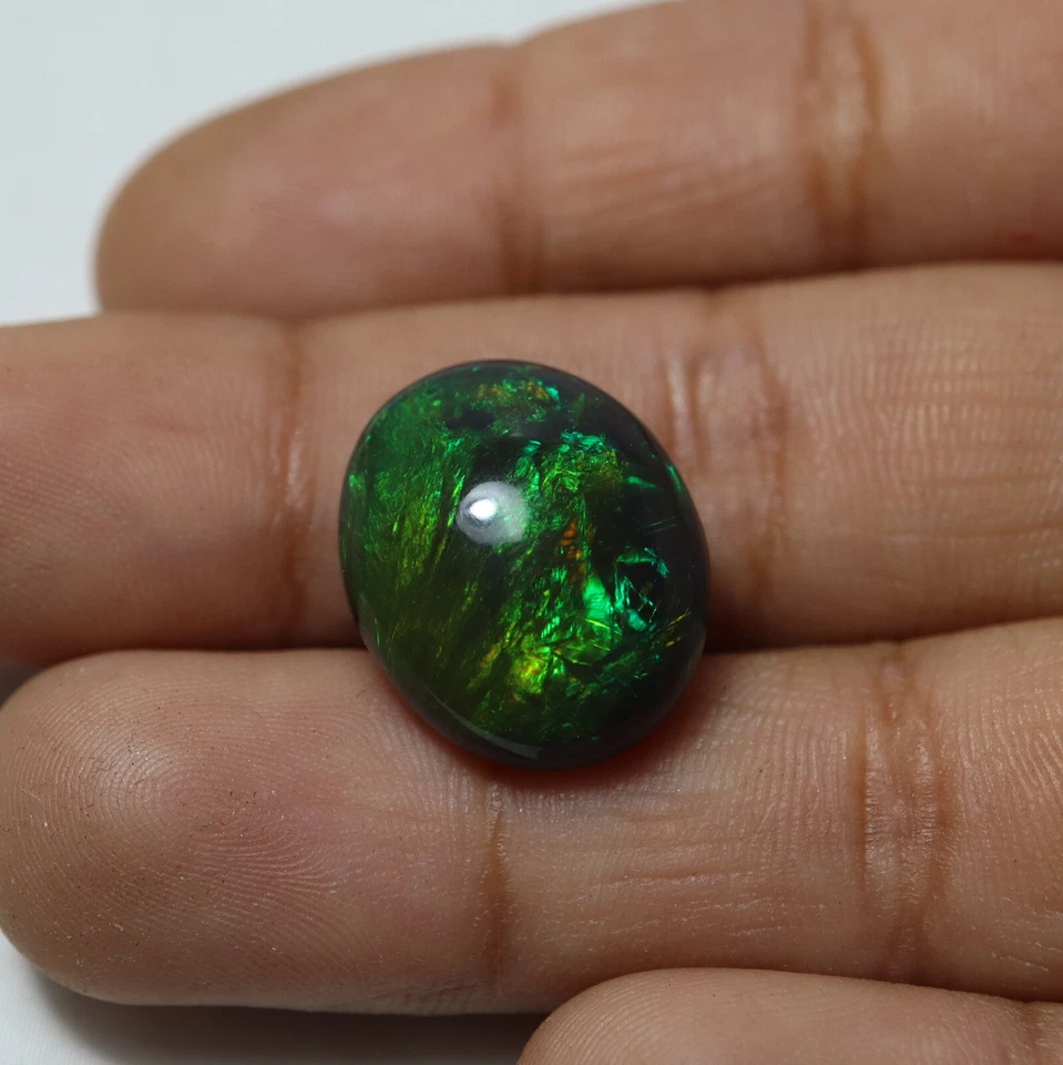 8,5 quilates 16,7 x 13,6 mm real AAA verde fuego ahumado negro ópalo etíope cabujón ovalado Foto 2 de 4