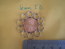 200 PCS. STAINLESS STEEL SPLIT RING 4 6mm. I.D. X 8MM O.D. 45 LBS. TEST