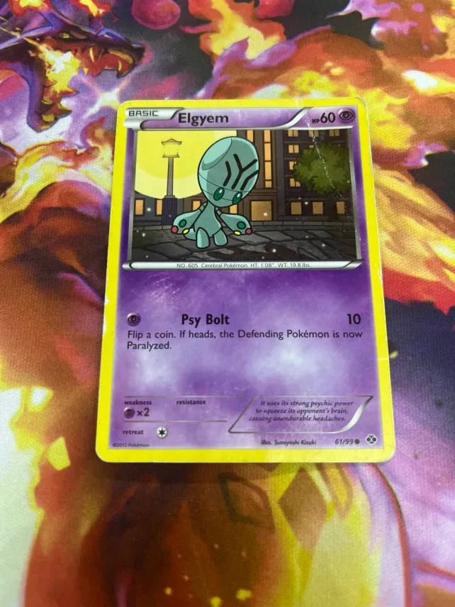 Elgyem 61/99 Next Destinies Regular MP-Moderately Played Pokémon TCG