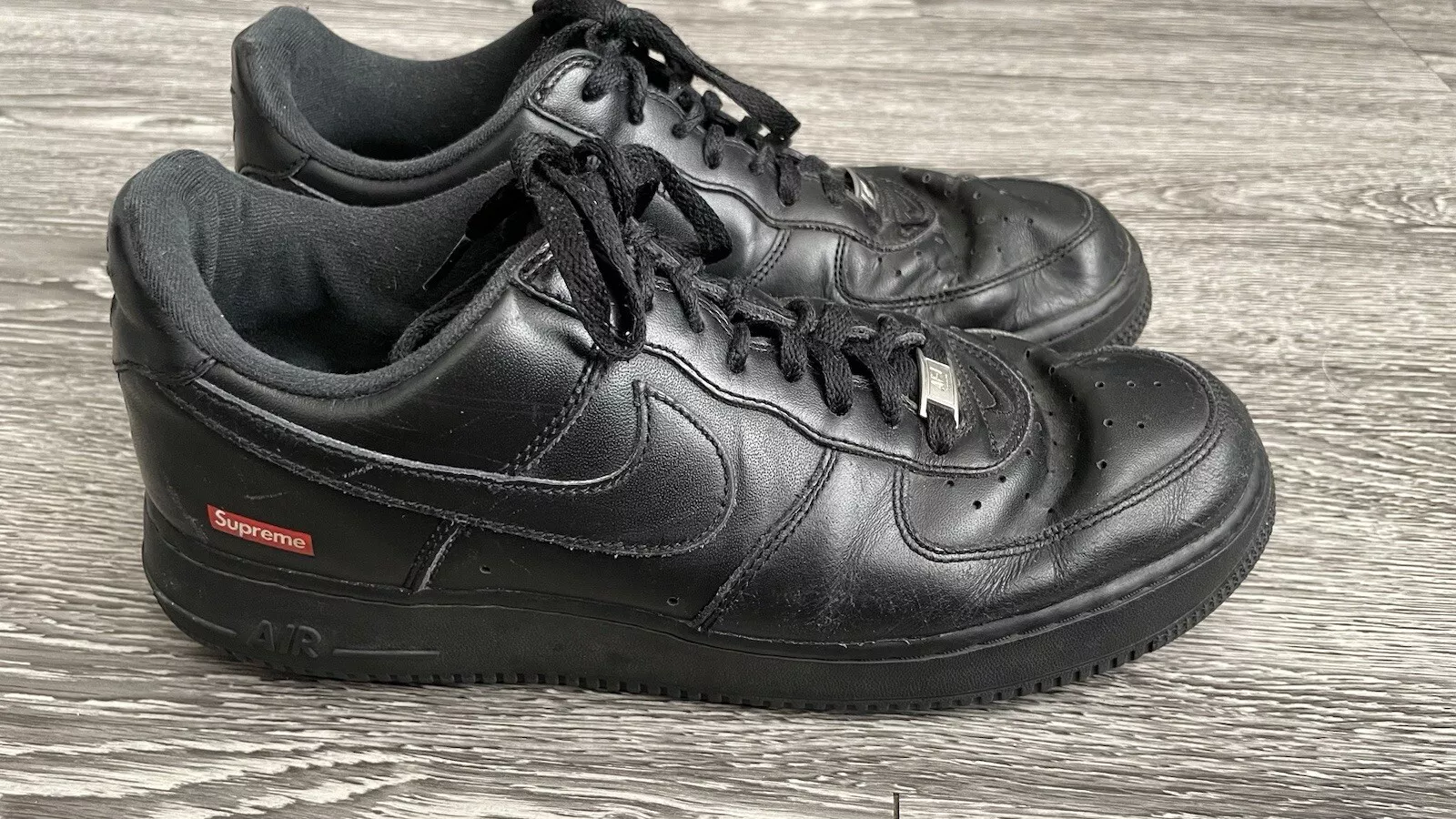 Logo Nike Air Force 1 Low x Supreme Box Homme   10,5   Lire