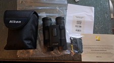 Nikon Aculon A30 10x25 5X Binoculars with Case and Neck Strap Used