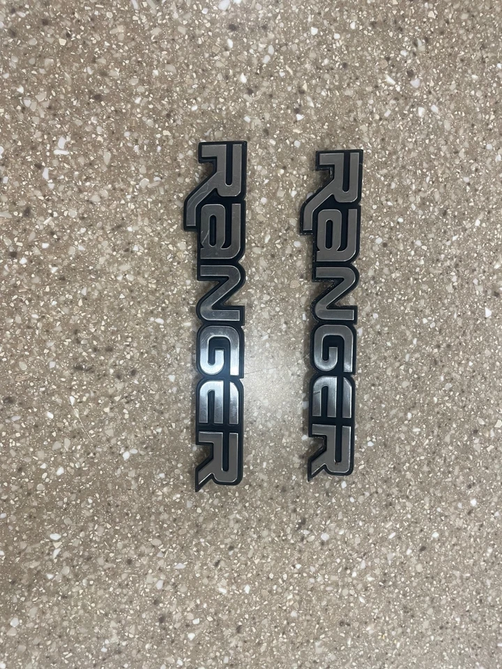 Ford Ranger 1993-2005 LH RH guardabarros lateral emblema insignia logotipo par OEM Foto 2 de 4