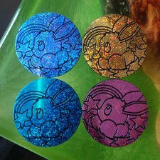 Pokémon TCG 4x Evoli Coin XXL Münze Prismat...