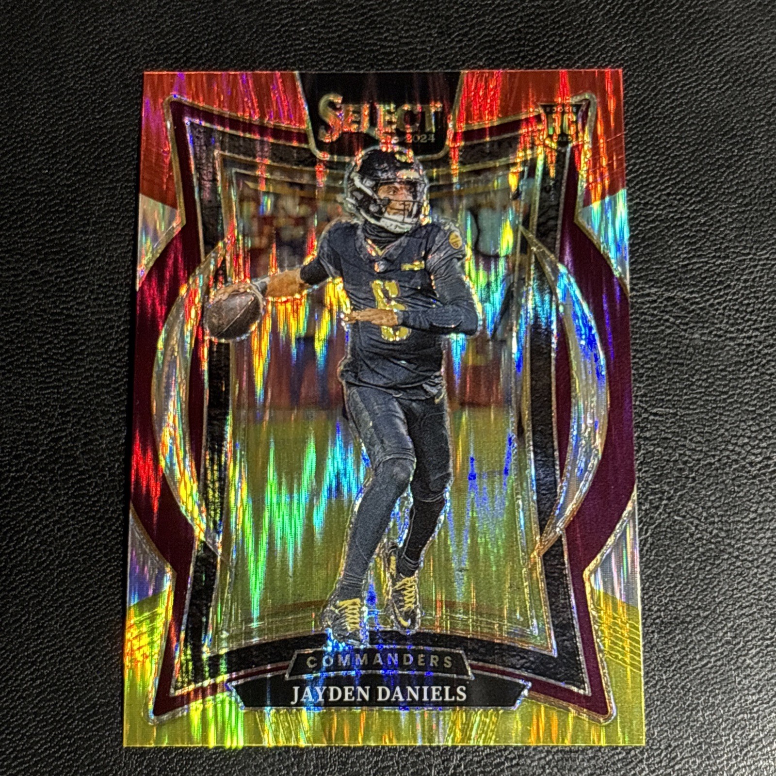 2024 Panini Select - Concourse Jayden Daniels #26 Red & Yellow Shock Prizm (RC)