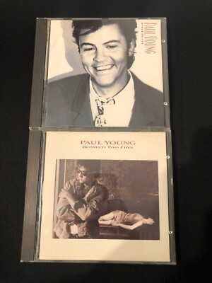 PAUL YOUNG - Between Two Fires und Other Voices Musik CDs Alben