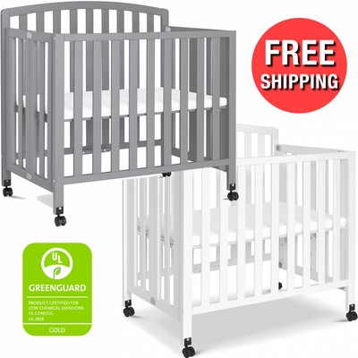 rolling mini crib