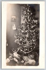 RPPC Postcard Christmas Greetings 2 Children Christmas Tree *207
