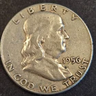 1956d Franklin silver dollar.low mint