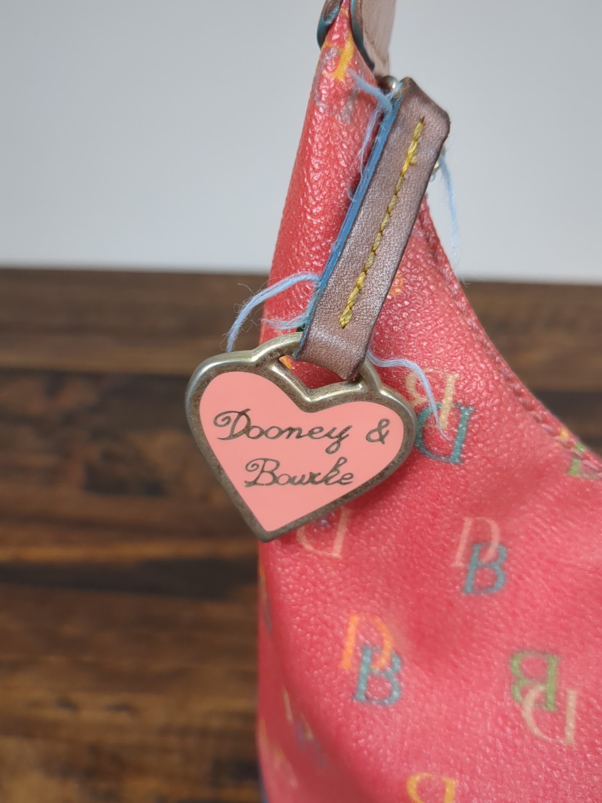 Dooney & Bourke Raspberry Logo Bucket Bag Purse Leather