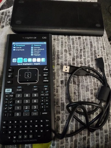 Calculatrice graphique et programmable TI-Nspire CX CAS preque neuve !