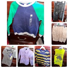 Lot 4 of 7 pieces of clothing for a boy: T-shirts, shorts, pants..Size 5T