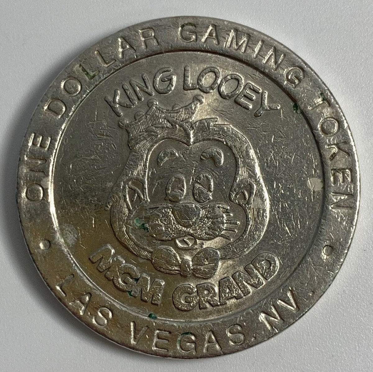 1993 MGM GRAND Las Vegas $1 Gaming Token One Dollar KING LOOEY