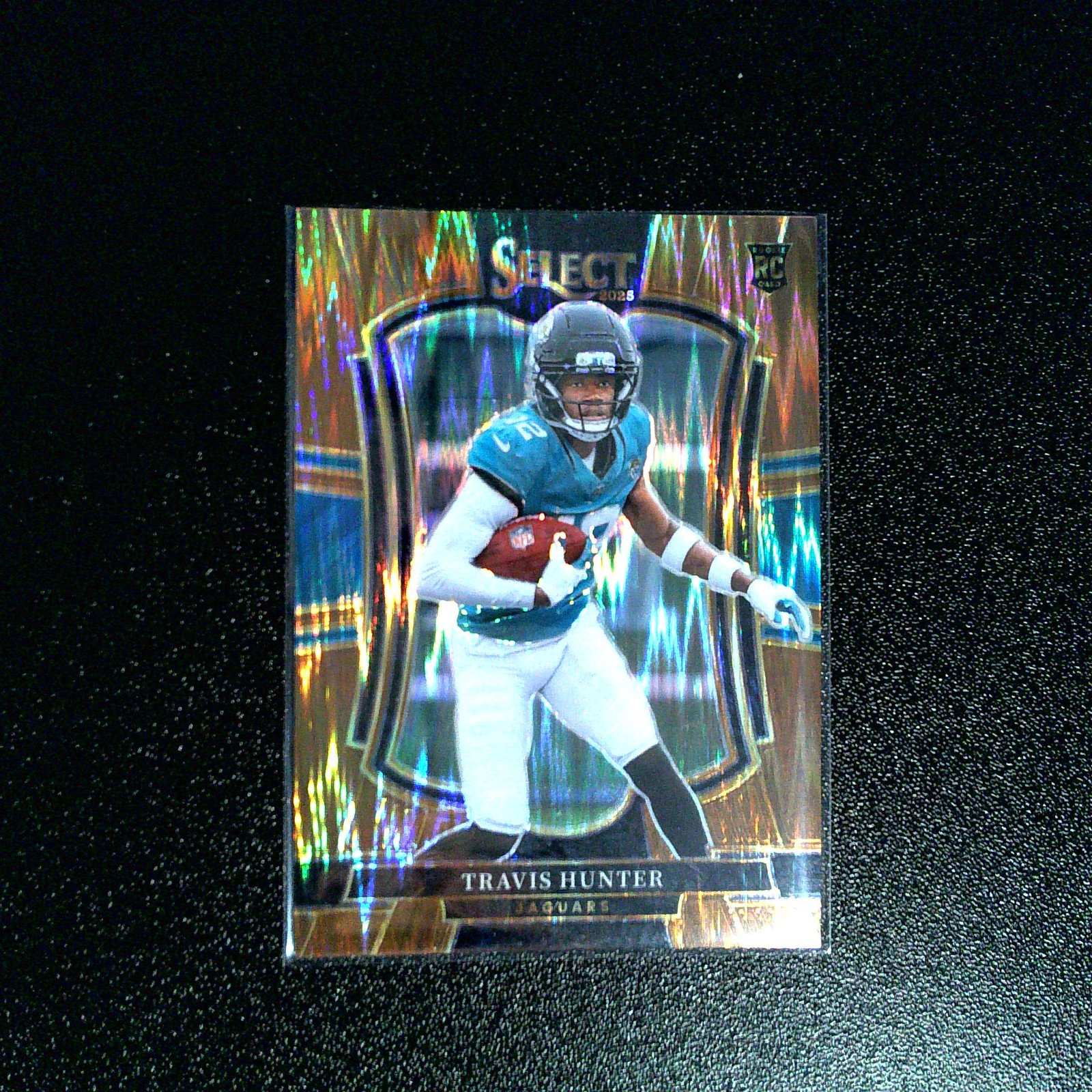 2025 Panini Select #128 Travis Hunter Copper Prizm Shock #/899