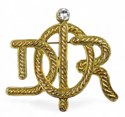 Authentique broche Christian DIOR vintage, dorée à l'or fin 24 carats et signée - Photo 1/4