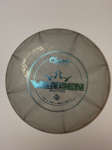 Dynamic Discs Warden – Classic Burst Plastic – 174g — Classic Burst, 174g. Exact item photographed by BlueJayDG.