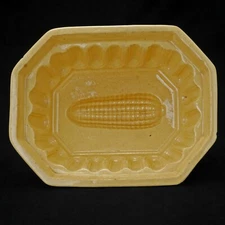 Yellow ware food mold with corn design circa 1900