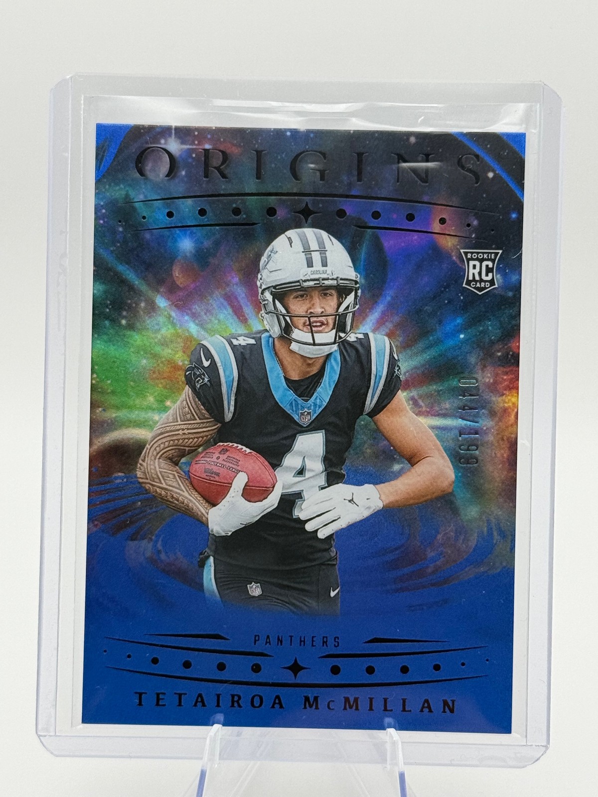 2025 Panini Origins #116 Tetairoa McMillan Rookie Card Holo Blue #/199