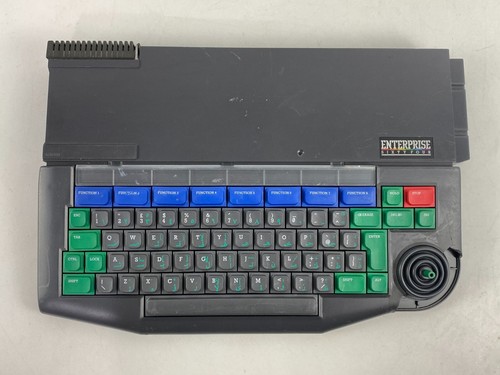 Ancien système informatique domestique ENTERPRISE 64 PAL clé arabe et anglaise