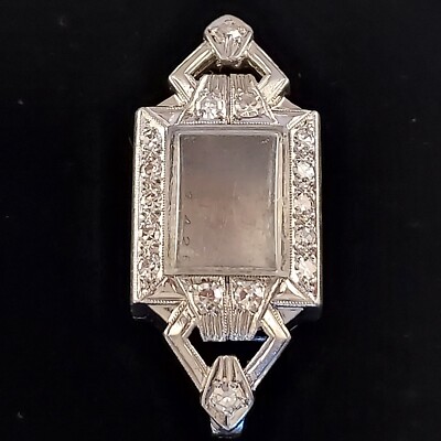Estate Platinum Diamond Halo Watch Case. 1/2'' Width. 1-1/4'' Length. 7.4 Grams.