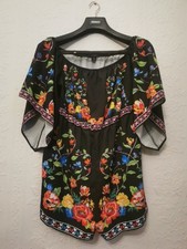 Women's elasticated playsuit with floral pattern print