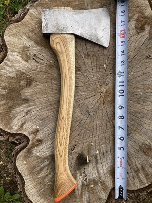 Vintage Genuine Norlund  Axe  camper  embossed .