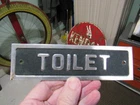 VINTAGE ORIGINAL GAS STATION SERVICE STATION TOILET SIGN EMBOSSED SIGN