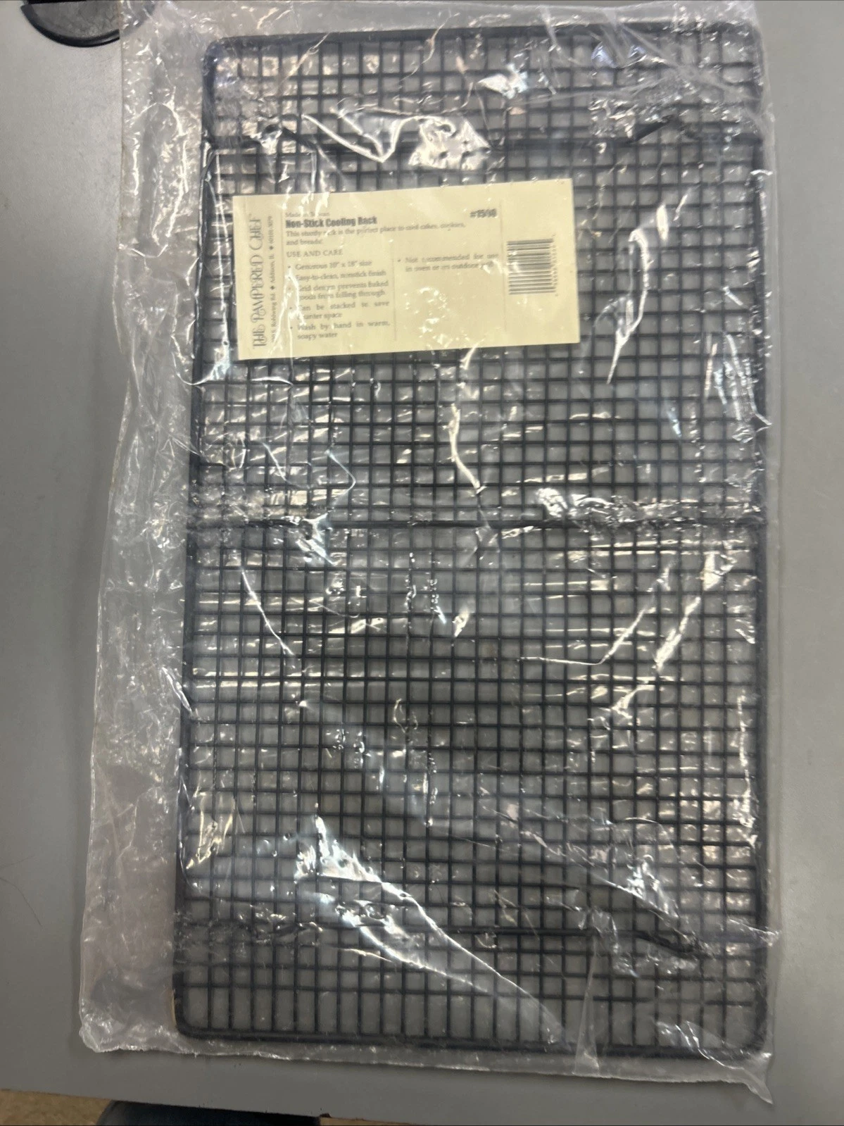 NEW PAMPERED CHEF #1587 One Black Stackable Cooling Rack Rectangle Sealed Bake