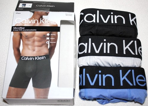 Paquete de 3 calzoncillos boxer Calvin Klein de microfibra elásticos multicolores ropa interior $47 - Imagen 5 de 8