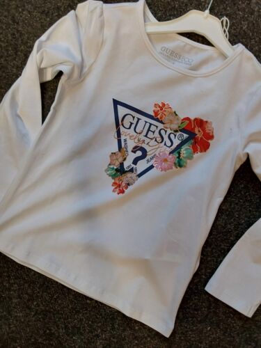 SALE NEW GIRLS GUESS WHITE LONG SLEEVED T-SHIRT SIZES 4 YRS  5 YRS  6 YRS  7 YRS - Picture 1 of 1