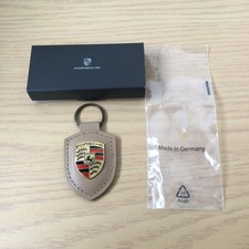 Porsche Genuine Crest Key Holder Beige New OEM Accessory WAP0500980H Unused