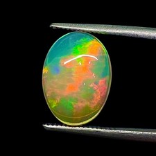 3.3 Cts Natural Ethopian Opal 13.5x9.5mm Oval Cabochon Multi Fire Loose Gemstone