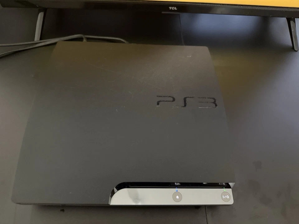 Sony PlayStation 3 Slim Negro Foto 3 de 4