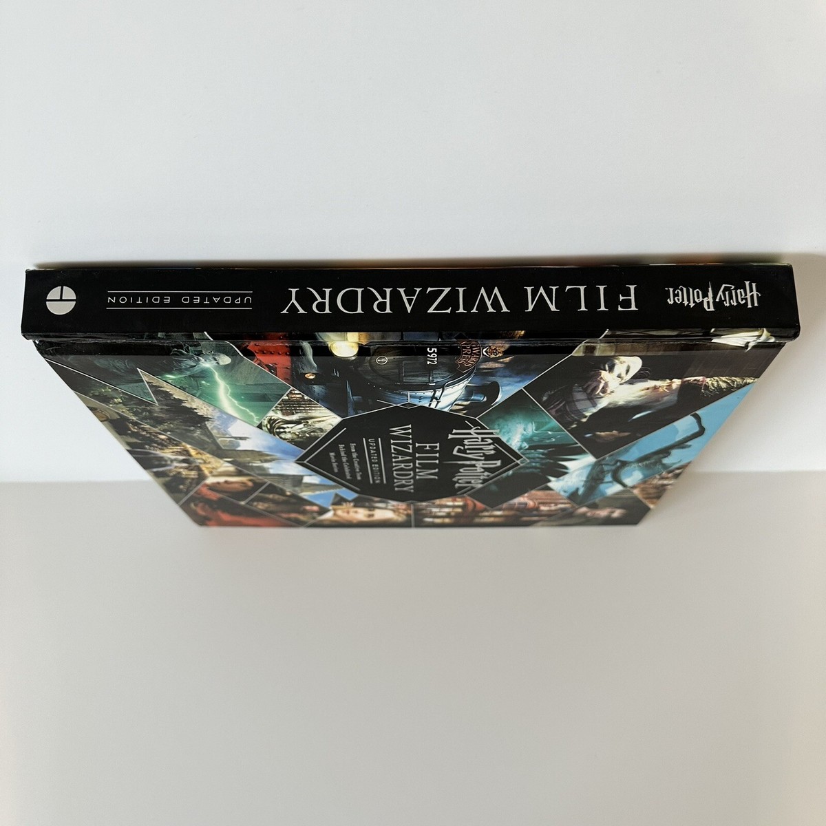 洋書 HARRY POTTER FILM WIZARDRY Amazon.com: Harry Potter Film Wizardry (Revised and Expanded