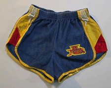 vintage niebiesko-żółte frotte szorty do jazdy na rolkach mają hot rollers