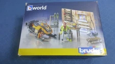 Bruder World 63102 Mountain Hut with Snowmobile and Figure With Accessories