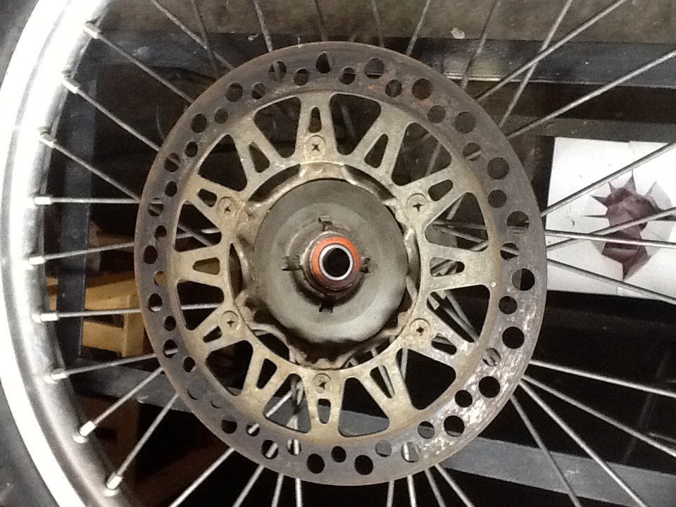 1990 Suzuki rm125 front wheel rim with front rotor and tire rm 125 1989