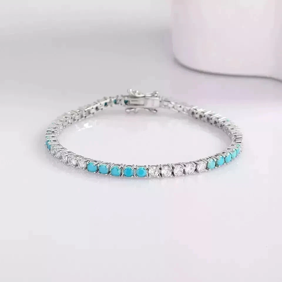 Brazalete de tenis turquesa/diamante creado en laboratorio de corte redondo de 4 mm de oro blanco de 14 K Foto 3 de 4
