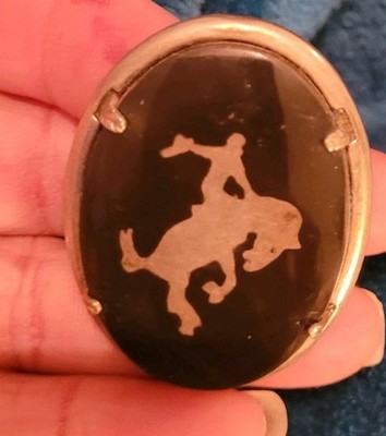 BUCKING BRONCO COWBOY BOLERO TIE MADE OF BLACK STONE AND SILVER METAL