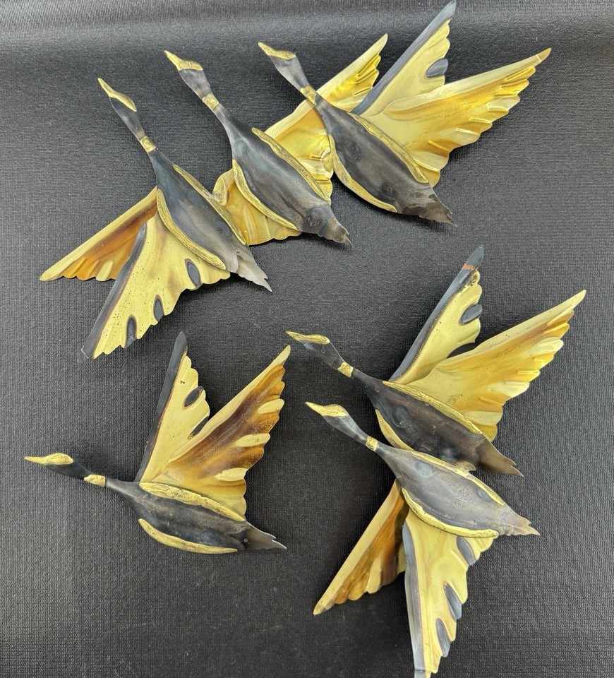 A genuine set of 3 MCM metal flying geese wall sculptures — the quintessential mid-century modern statement piece that interior designers still chase.