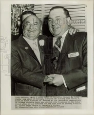 1955 Press Photo Richard Daley and Morris Sachs embrace at Chicago headquarters.