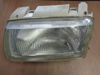 VW Polo 6N1 Scheinwerfer links LWR-Anschluss 7-polig 962495-00 HELLA Bj.94-99 - Bild 1 von 3