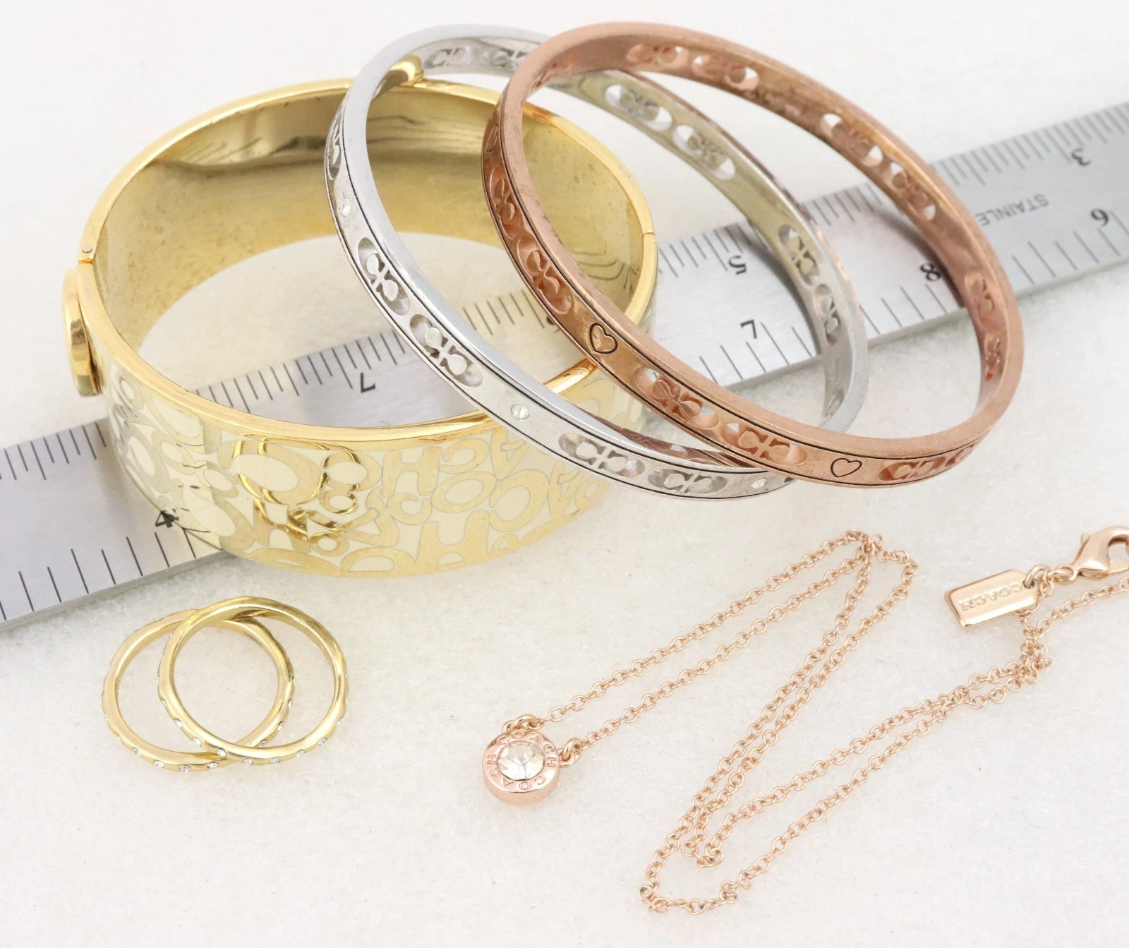 Lotto gioielli marca Coach ciondolo collana anello braccialetto logo C oro argento