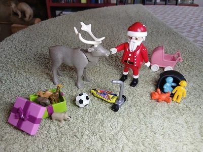 Cadeaux et jouets pour Noël PLAYMOBIL - Père-Noël, renne, sac et cadeaux - Photo 1/4